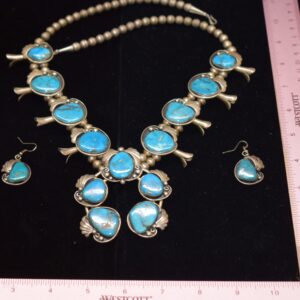 Turquoise Squash Blossom  $1800 by Charley